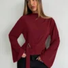 belted wrap blouse
